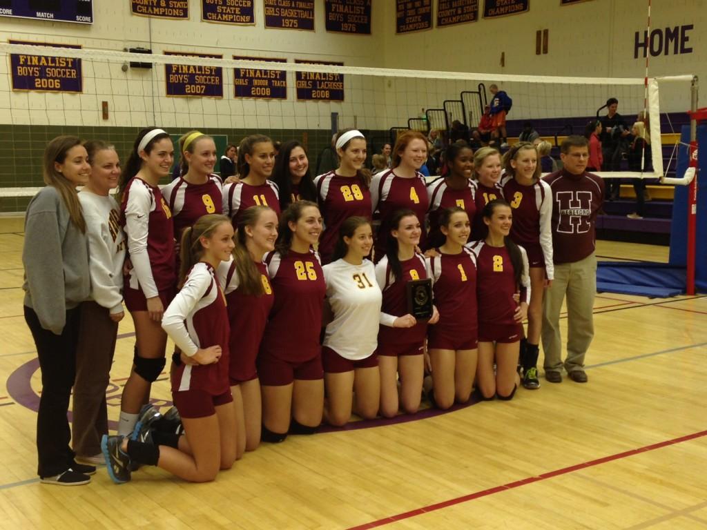 The Varsity volleyball team poses after winning the 2A regional finals. They beat Loch Raven   3-0  It feels awesome. said LeAnne Collins (12) We havent gone this far in a long time so it feels good to be a part of it.