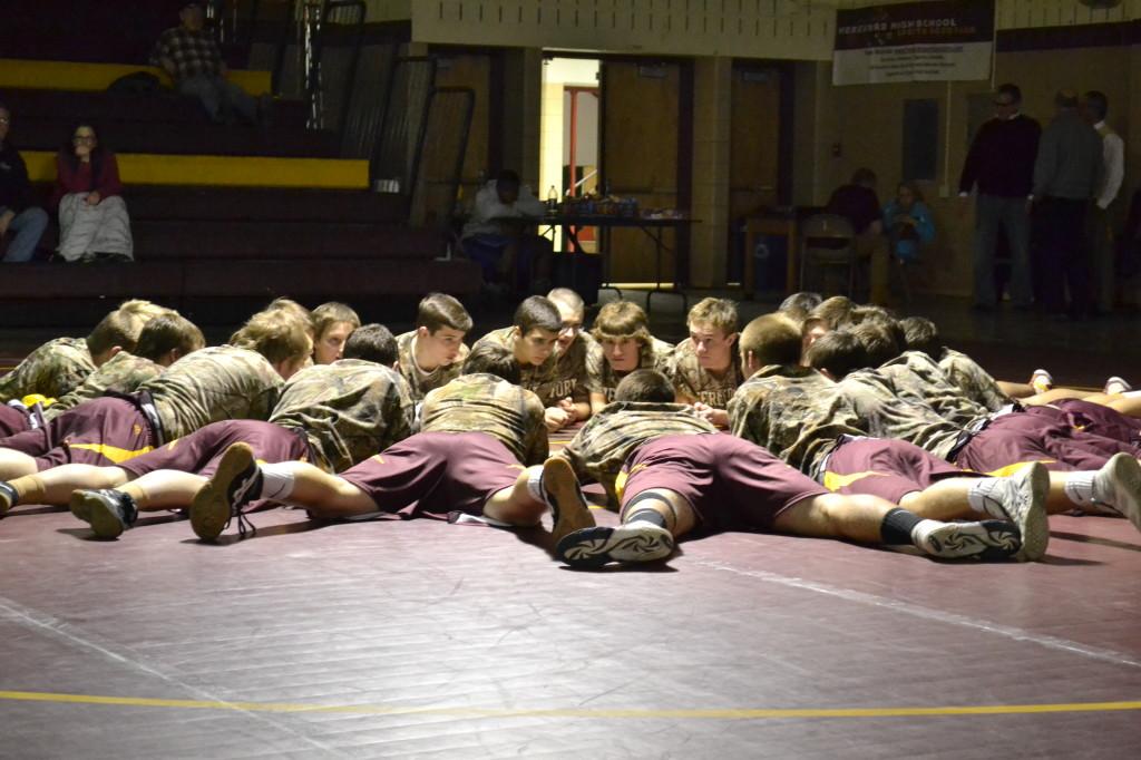 Photo by Chad McCartin
The wrestling team practices after school. “We didn’t make it to the state tournament last year which was disappointing,” said Mike Swiger (12).