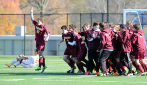 Bel Air, Md. 11/9/13 Staff Photo by Matt Button The Hereford Bulls soccer team celebrate after an overtime score to win 2-1 over Oakland Mills in Saturdays Class 2A boys soccer state semifinal game at Bel Air High School.