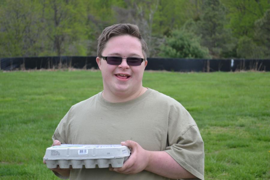 Zach Morell (12) participates in Fun Day sponsored by the FFA. Students in the FALS Program played games related to agriculture.  Photo by Samantha Preston