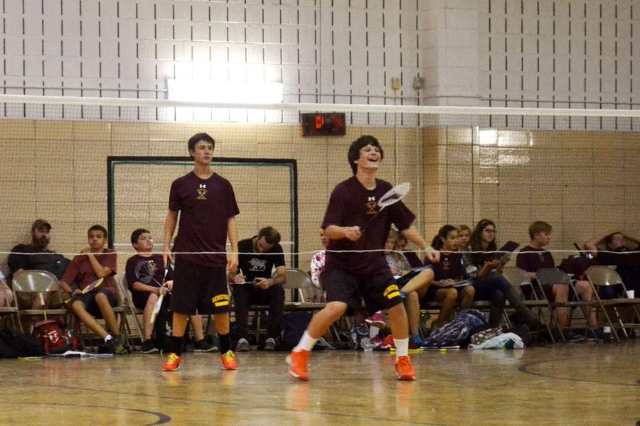 Jd Woods (right) and Cameron Yeager (left) face Eastern Tech in a doubles match. The team carried on after an unexpected loss of players after a strife with the new coach Mr. Grace. 