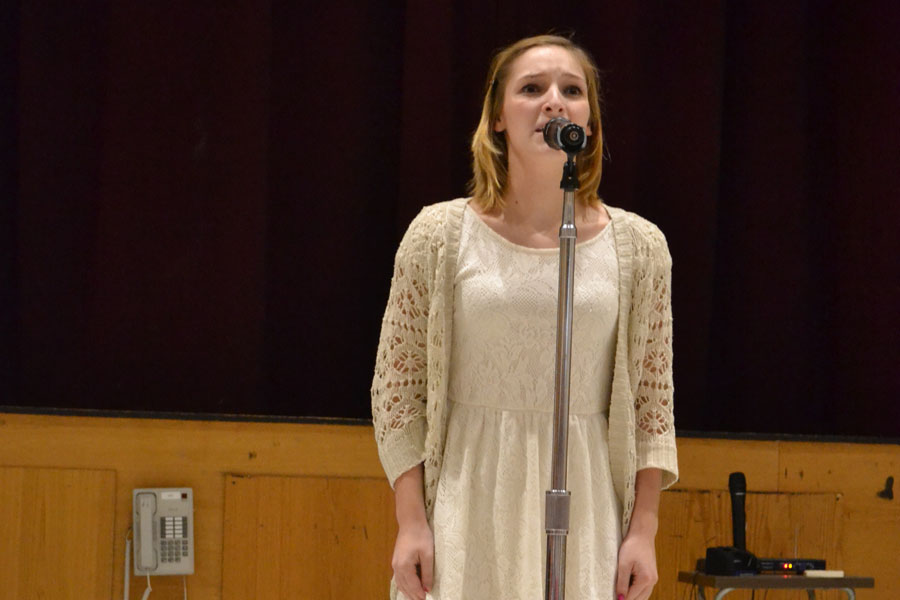 Adriana Culotta (15) recites The Hospital Window for Poetry Out Loud. She was awarded first place.