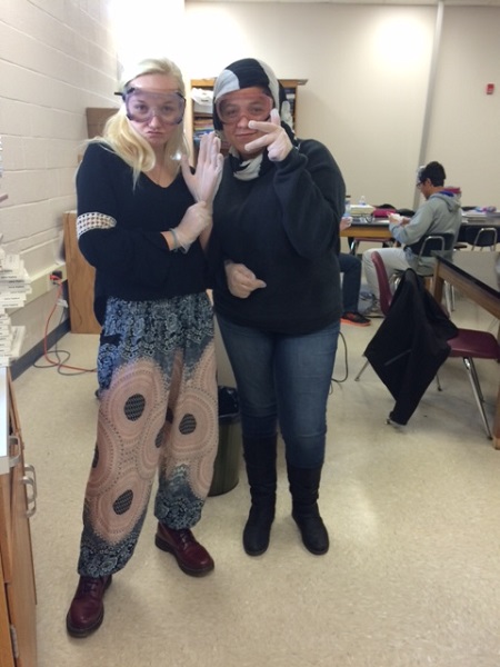 Anatomy class disects sheep eyeballs
