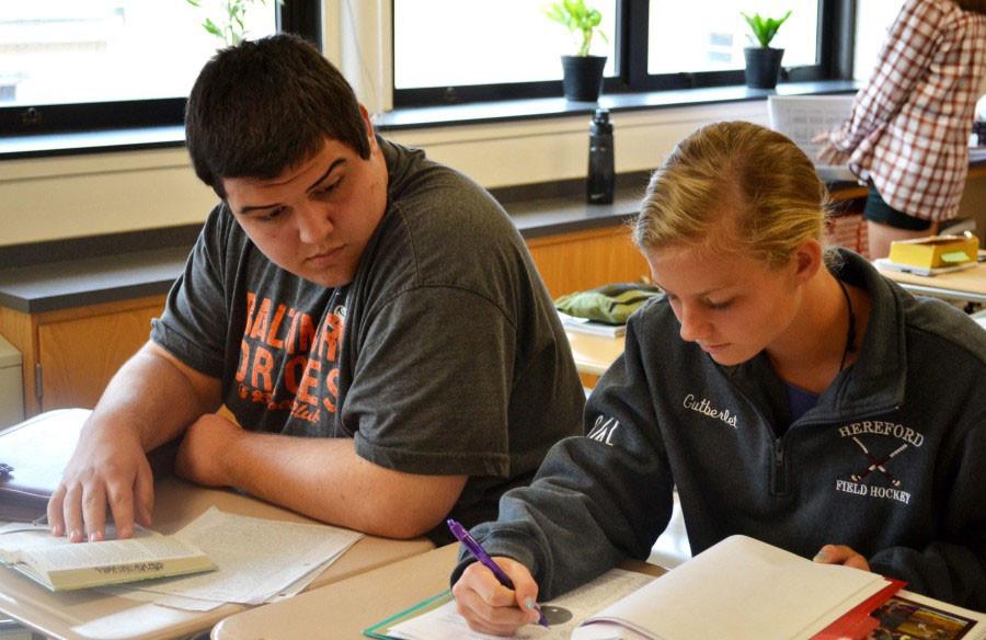 Patrick Chaney (15)sports an orioles tee in the class room. The orioles lost valuable players Nick Markakis and Nelson Cruz after the 2013 season.