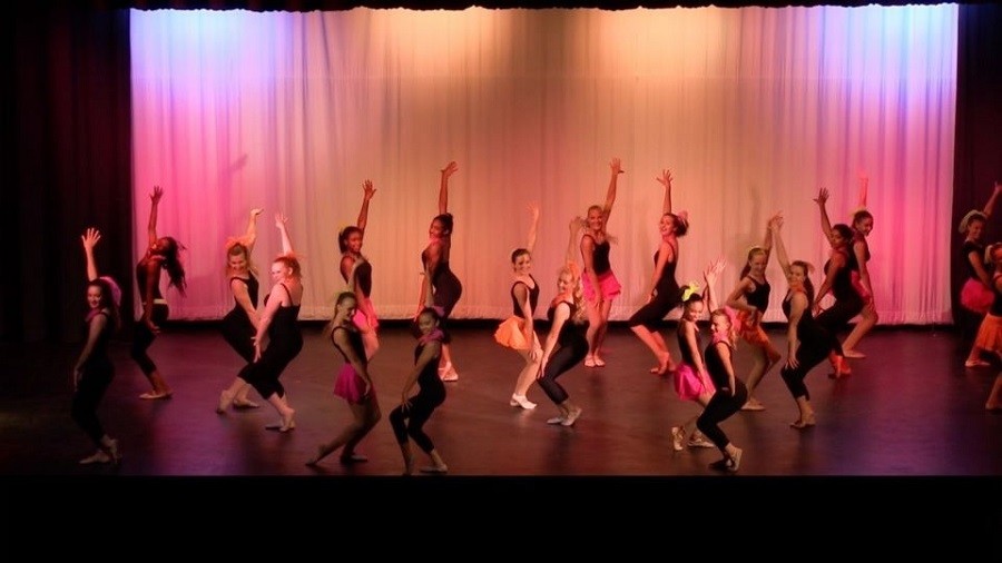 Dance I students dance to "Swingin' the Mood" by Jive Bunny and the Master Mixers.