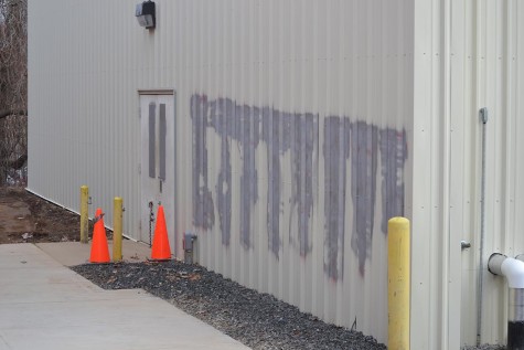 Gray paint covers the graffiti on the side of the weight room building. The cost to clean up the vandalism was about $5,000. 