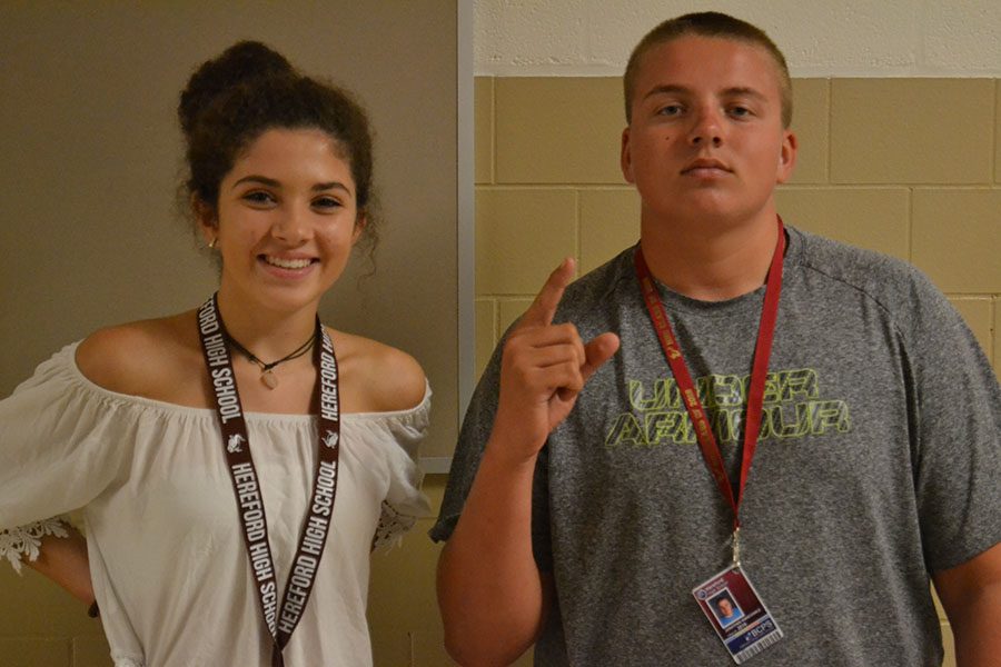 Caroline Diaz ('19) and Jon Wancowicz ('18) wear special lanyards for their class. All money from the lanyards will go to class funds.