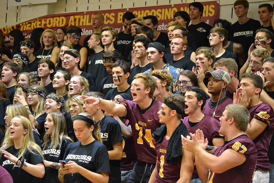 Nick Greenspan (17) and fellow seniors get heated at the Pep Rally basketball game. The seniors lost to the team of faculty, 23-17, and later whined about the injustice.