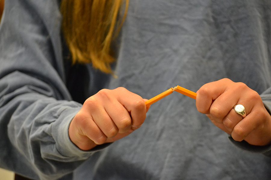 Madeleine Palumbo ('18) breaks pencil in frustration as pressure builds over the SAT. She signed up for the SAT class, but was assigned it after she took the SAT.