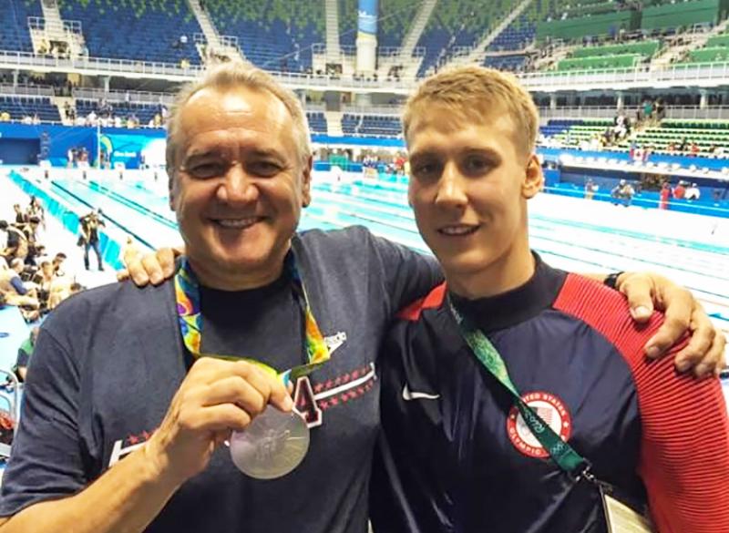 Athletic Director Mike Kalisz stands with his son Chase Kalisz at the Rio Olympics. Chase Kalisz took home a silver for the US in the 1400 meter Individual Medley. 