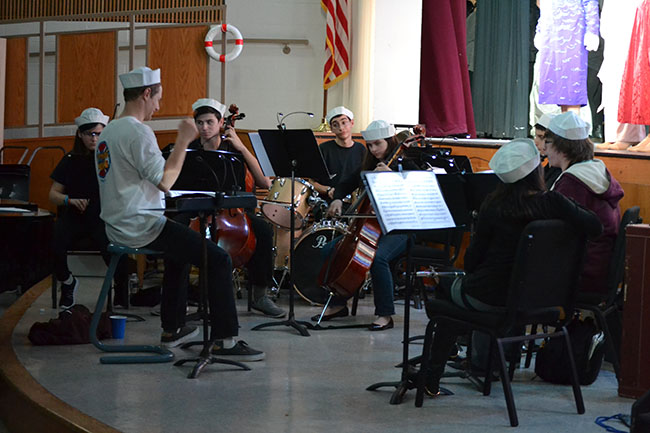 The Pit Orchestra, directed by Choir and Guitar teacher David Sobel, accompanies the actors and actresses onstage. 