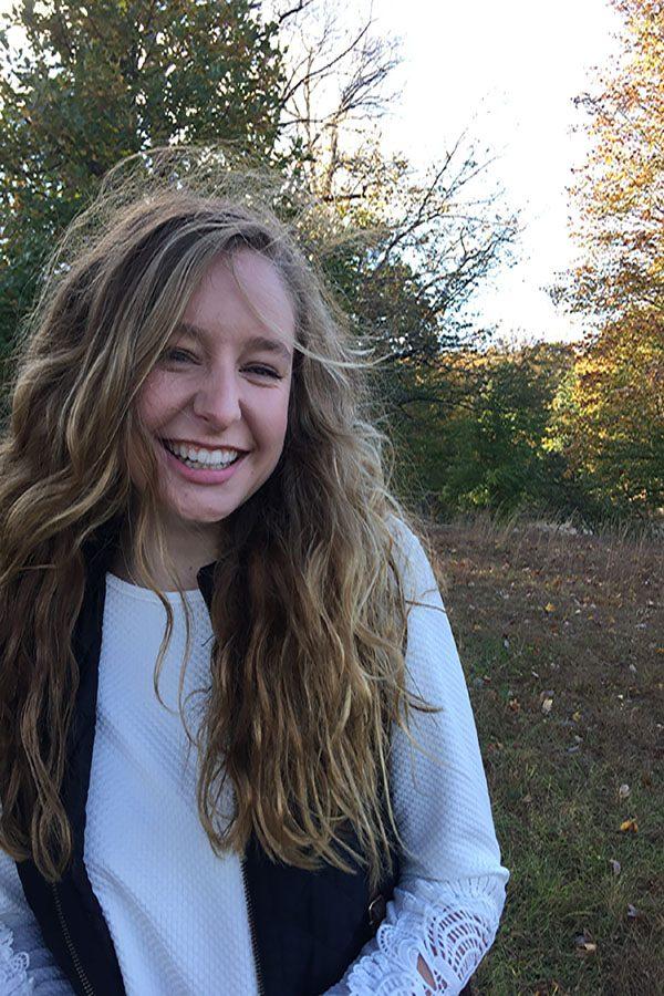 Lexi Thompson (17) hikes in the Loch Raven woods. She smiled after her most recent expedition. 