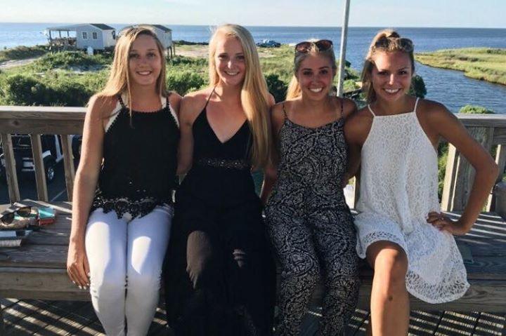 Diana Wittich ('17), Alex Butz ('17), Kaleigh Brown ('17), and I pose for a picture at a restaurant in the Outer Banks. We drove down and stayed for a full week in Avon.