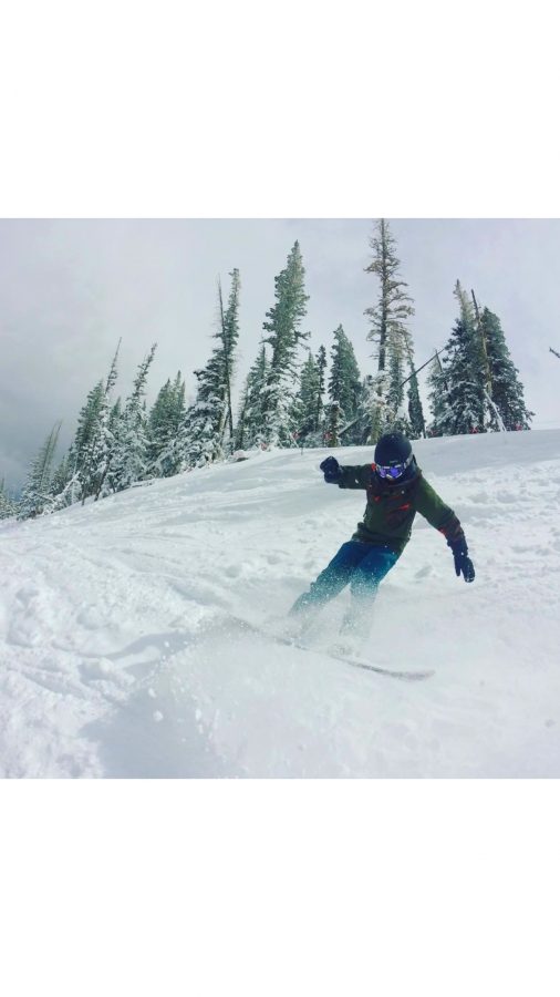 Henry Traynor (18) snowboards at Park City, Utah.