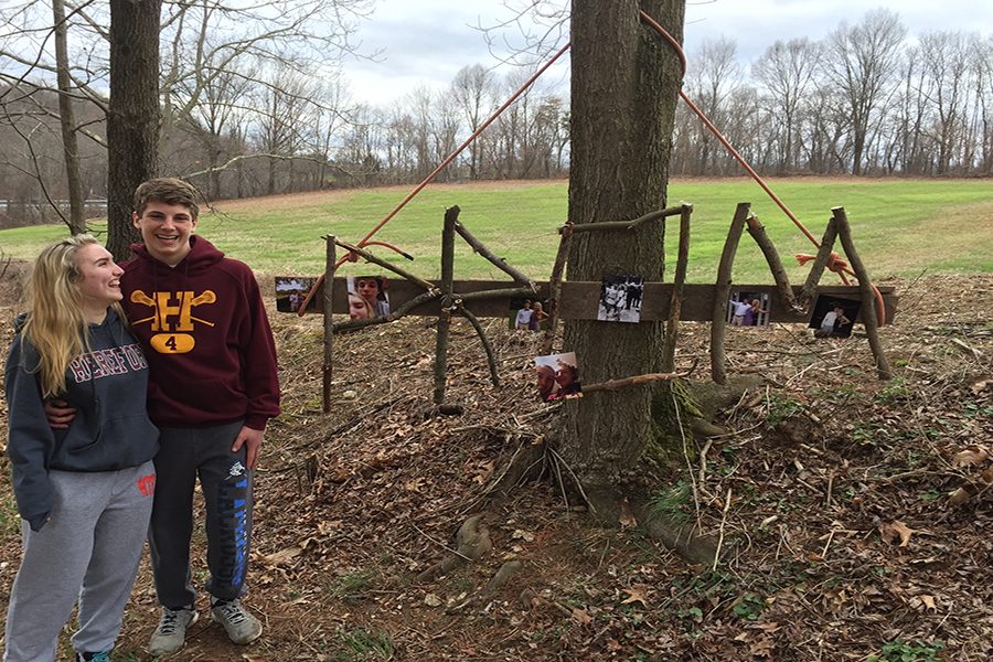 Henry Traynor ('18) asks Maggie Parks ('18) to prom with an original stick sculpture, decorated with pictures of their relationship.