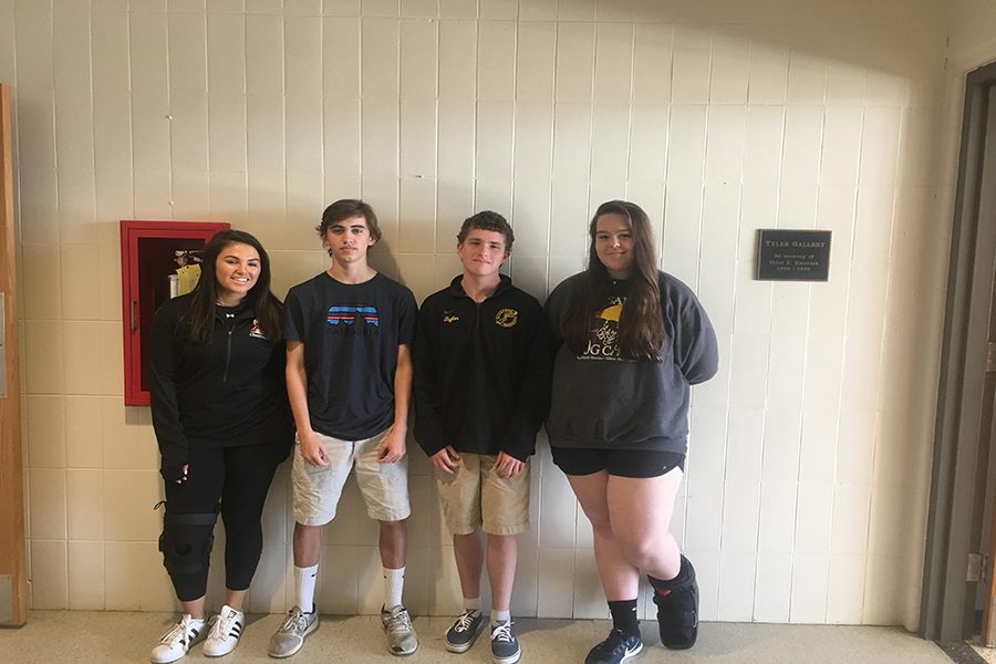 Lindsay Posner (20), Ben Caputo (20), Shane Taylor (20), and Megan ODonovan line up, knees in braces and ankles in boots. Their injuries have kept them off the playing field.