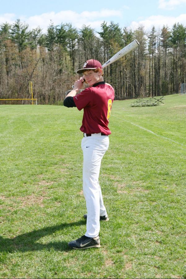 Marchineck+stands+ready+to+swing+as+a+freshman+on+the+Varsity+baseball+team.