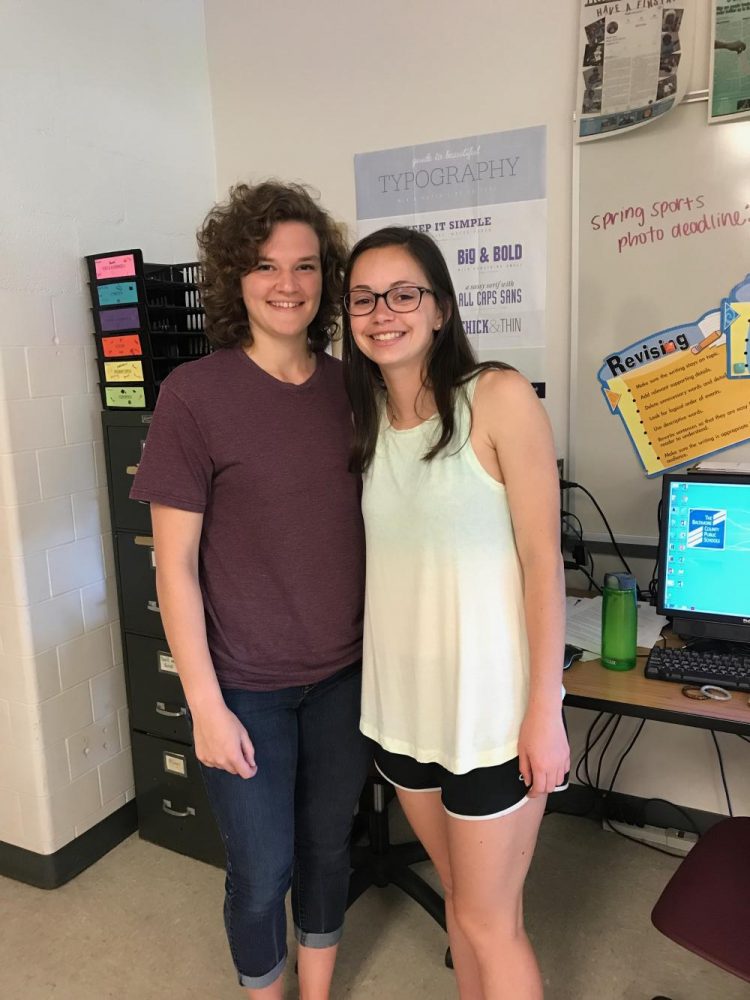 Emma Coleman (17) and Emma Reider (17) received their cords for Quill and Scroll