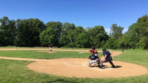 Travis Elseroad (17) hits a single into the outfield. Travis recorded two hits in the game helping the Bulls win 18-6.