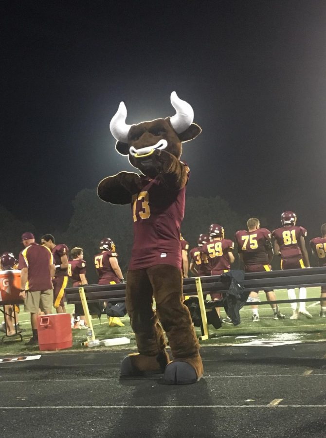 Brutus helps to rile up the fans at a football game. Social studies teacher, Nicole Maffei, orchestrated the mascot's arrival.