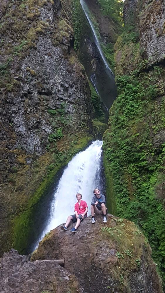 Jake Kline (19) and I sit on a rock we just climbed and take in the view. 