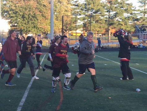 The allied soccer team celebrates another victory. They enjoyed playing at the pumpkin bowl and hope to win next year. 