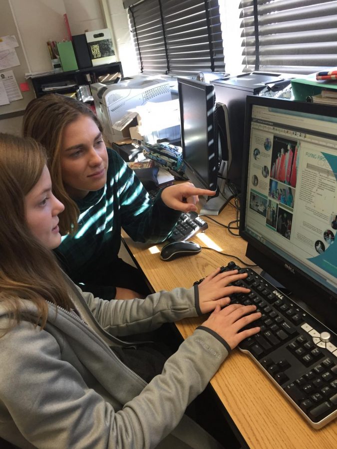 No days off (except A days). Madison Hackett (’19) and Rose Cabral (’19) collaborate on a page of the Pioneer. Yearbook students worked hard to achieve their deadlines.