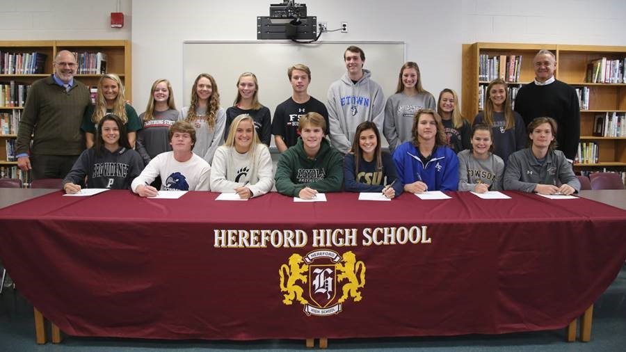 These athletes will take the field for their universities in their freshmen years'. Committed DI, DII,and DIII athletes of the Class of 2018 gathered in the Hereford High School library for the annual Signing Ceremony. 