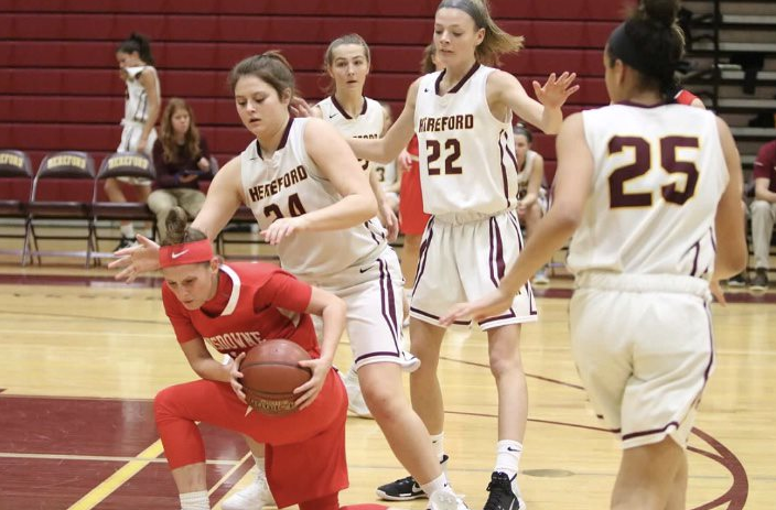 Cam Smith ('19), Lindsay Clarke ('20), and Brynne DeLuzio ('19) compete against Landsdowne High School.  The hard-fought game ended in a win for Hereford.