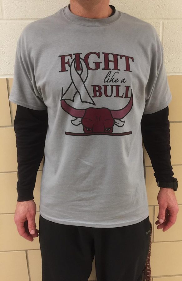 Coach Walter flaunts his Fight Like a Bull in support of the shootout. The shirts were designed by Daniel Stewart (18).