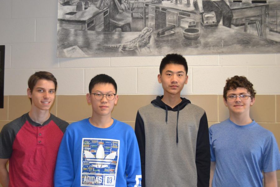 Bryan Roeper ('19) and Matt Simmons ('19) help their foreign exchange students in AP physics.  
