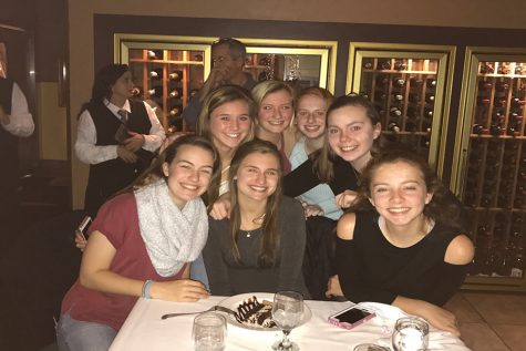  Nicole sits with her close friends while she enjoys her birthday dinner. Burkoski was appreciative of the friends that came to support her because she values friendship the most.