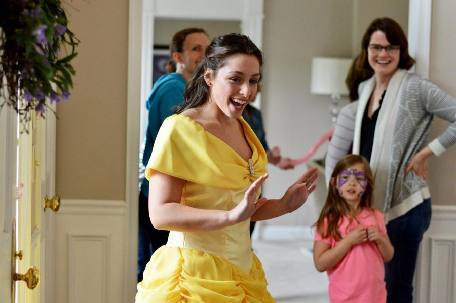 Violanti entertains a birthday party dressed as Belle from Beauty and the Beast. She sings a song from the Disney movie to eh aspiring princesses. 