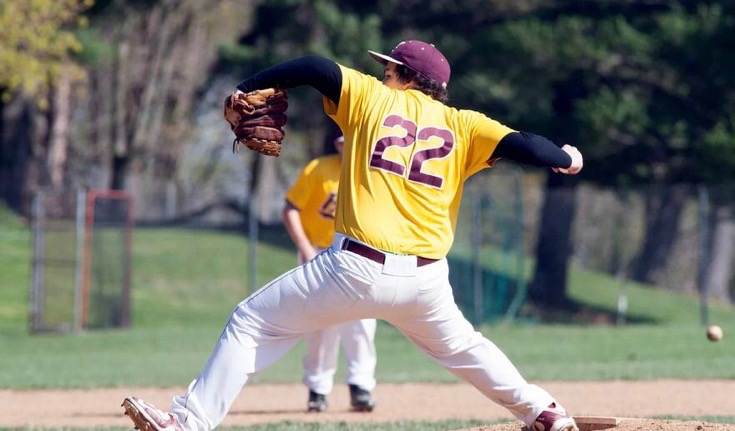 Crawford unleashes a pitch against an opposing batter. He employed up to four pitches last season. 