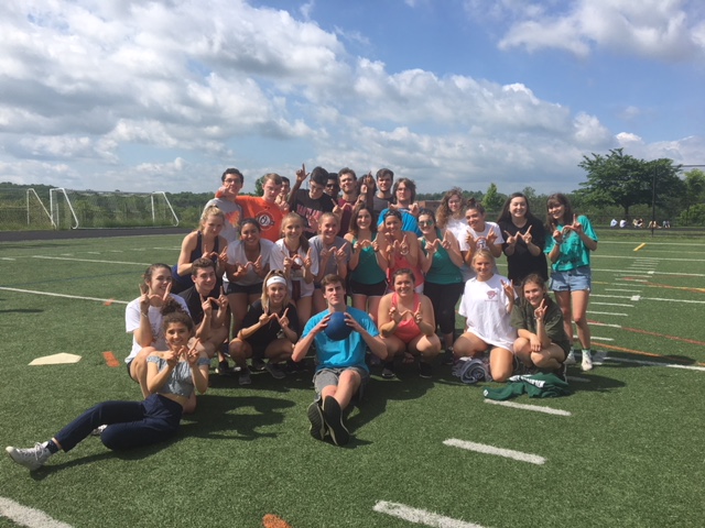 The AP English class celebrates their win with a photo. The team posed with the game ball.