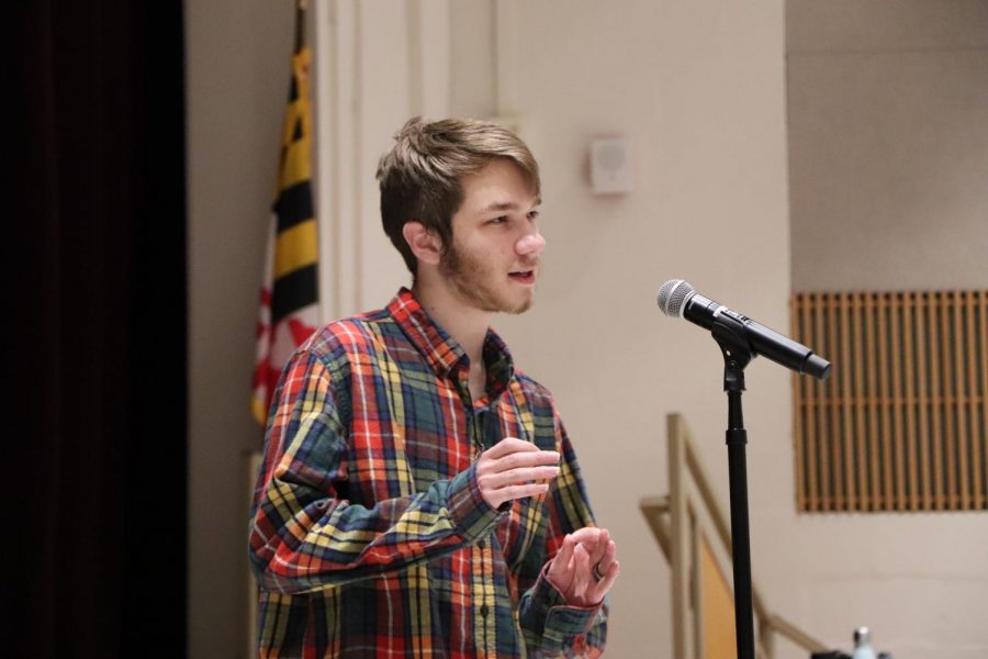 Garrick Rodman (19) recites one of his poems for the school-wide competition. He performed in front of fellow competitors, judges and students that came to watch the contest.