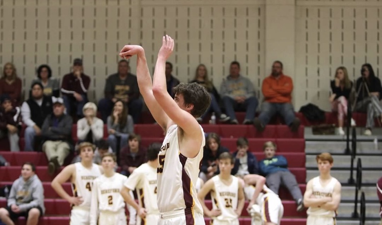 Suchy holds his follow through after shooting a free throw in overtime against Dundalk. The Bulls held on to win 59-56.