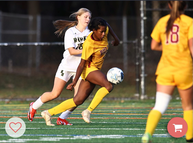 Atkins+takes+the+ball+forward+in+a+state+quarterfinal+matchup+against+North+Harford.+She+scored+the+game+winner+in+overtime+to+settle+the+game+at+three-to-two.+