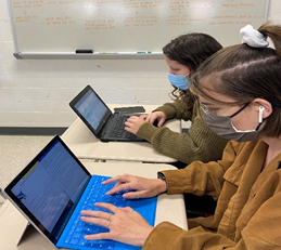 Sarah League (’22) and Eliza Nixon (’22) work on their novel for NaNoWriMo. Both accomplished their goal to finish with 50,000 words.