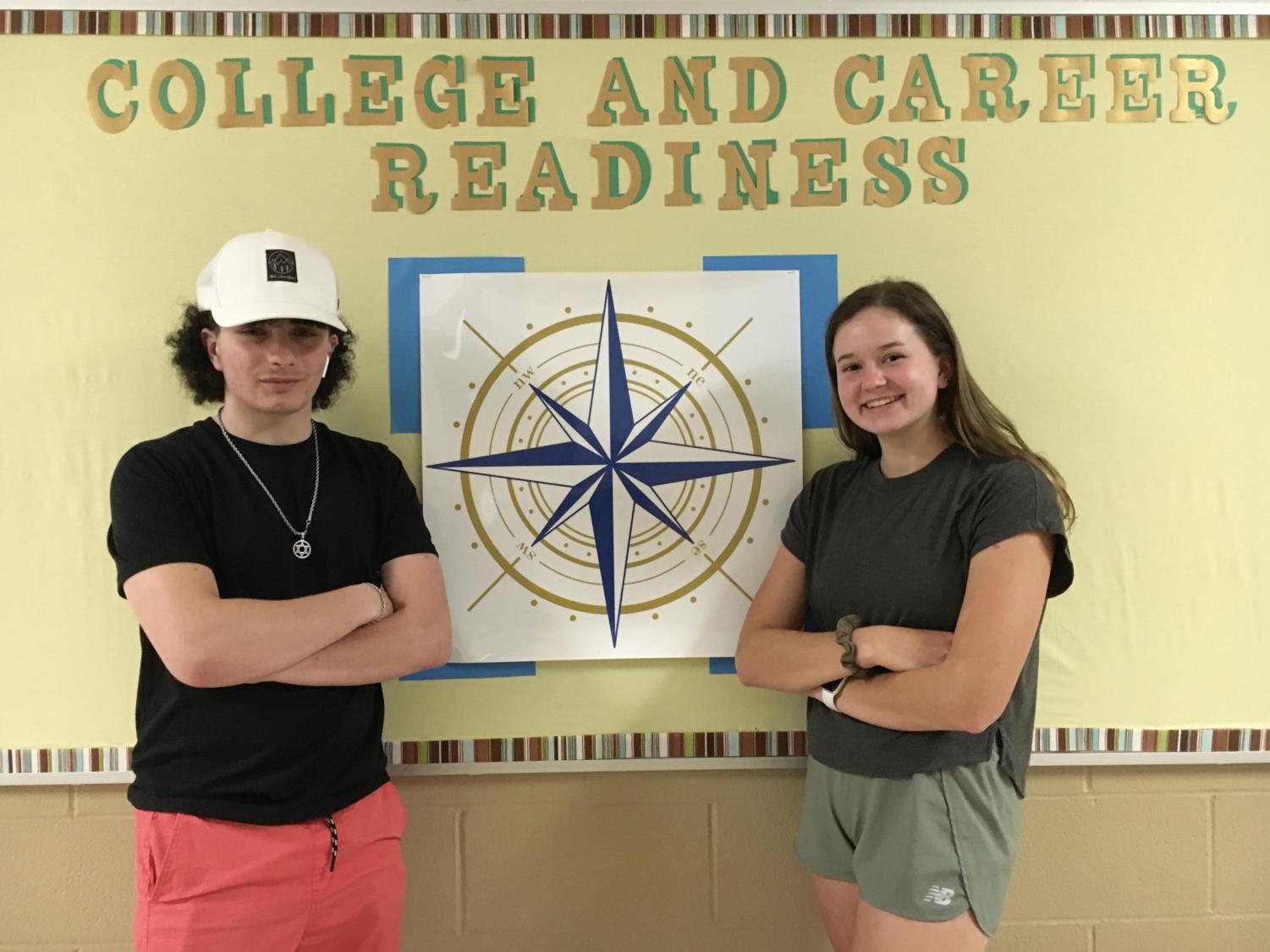 Gabe Balakirskiy (’25) and Megan Warrenfeltz (’23) pose in front of the Hereford college and career readiness sign. Both shared their view on how school impacts their dream. 