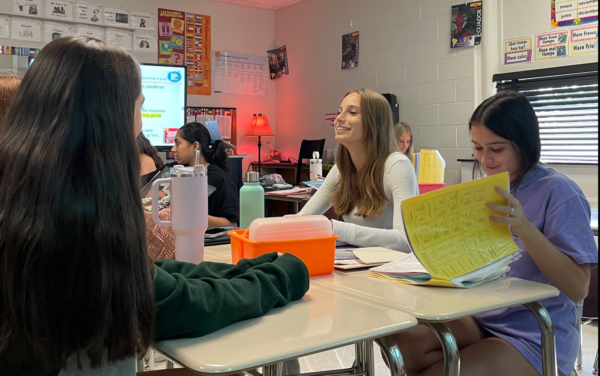 Juniors Morgan Izzo, Marlene Schoof and Ryan Fowler study in AP Spanish. New friends like these have helped Schoof’s transition tremendously.
